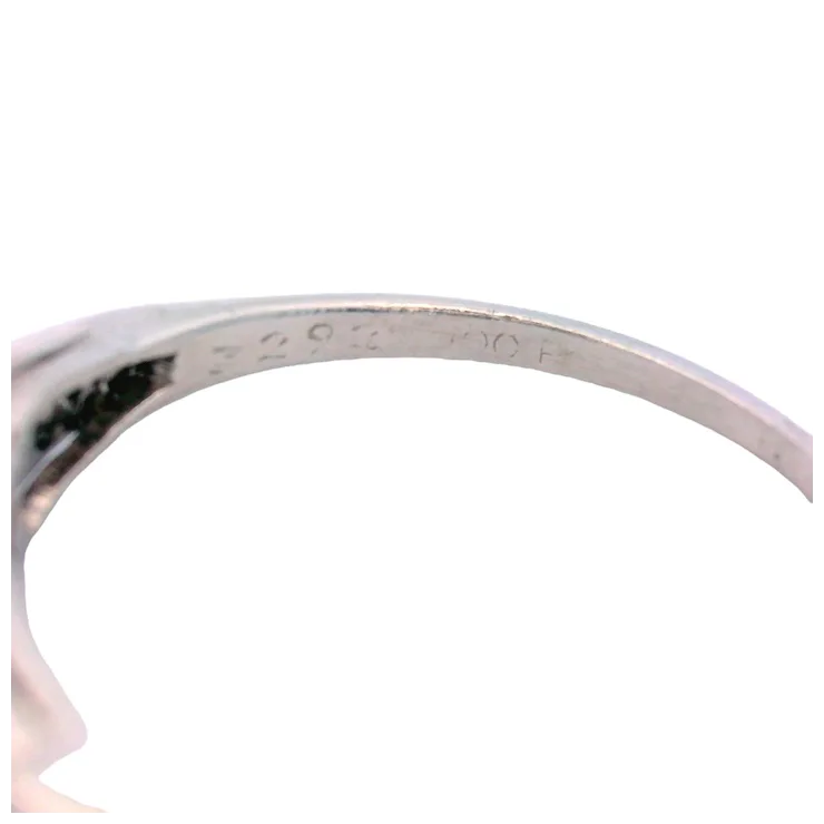 Close-up of a silver ring on a white background