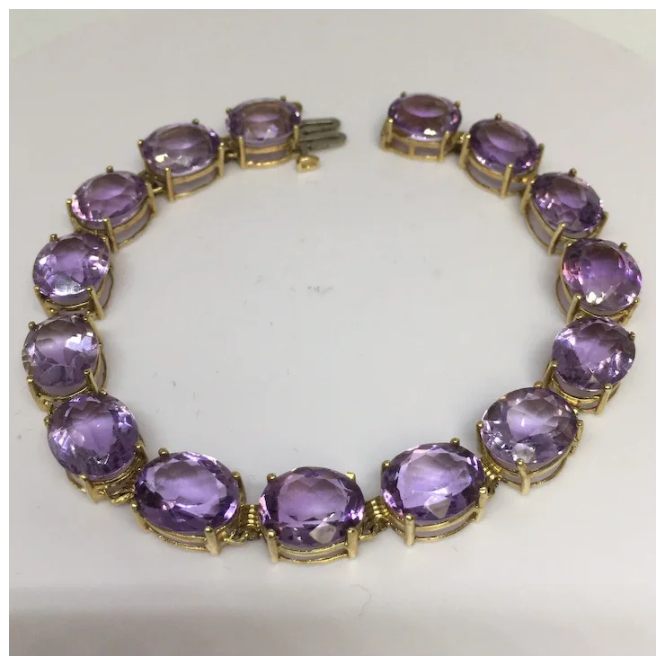 10K gold 11 mm by 9 mm 38 Ct Oval Natural Amethyst Tennis Bracelet Women 8 inch