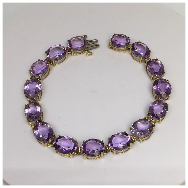 10K gold 11 mm by 9 mm 38 Ct Oval Natural Amethyst Tennis Bracelet Women 8 inch
