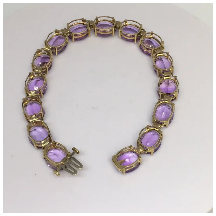 10K gold 11 mm by 9 mm 38 Ct Oval Natural Amethyst Tennis Bracelet Women 8 inch