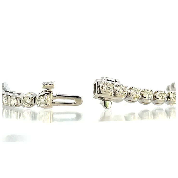 Pair of diamond earrings on a white background