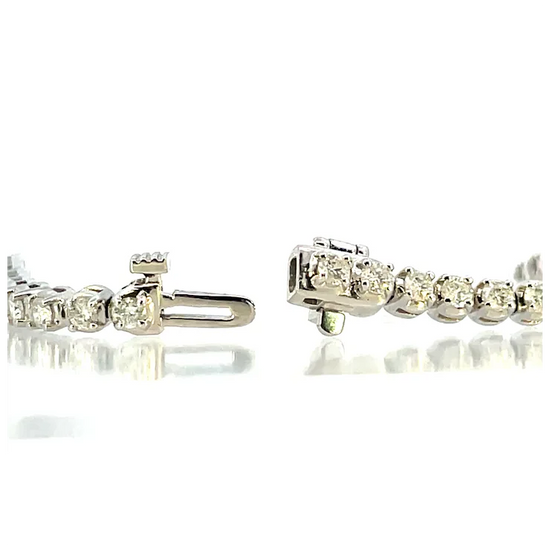 Pair of diamond earrings on a white background
