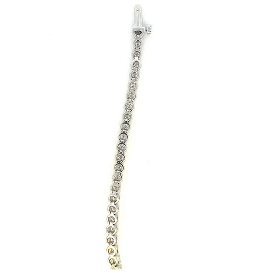 Silver bracelet with a lobster clasp on a white background