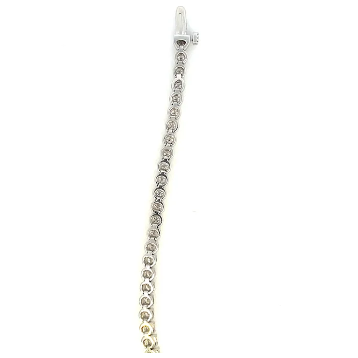 Silver bracelet with a lobster clasp on a white background