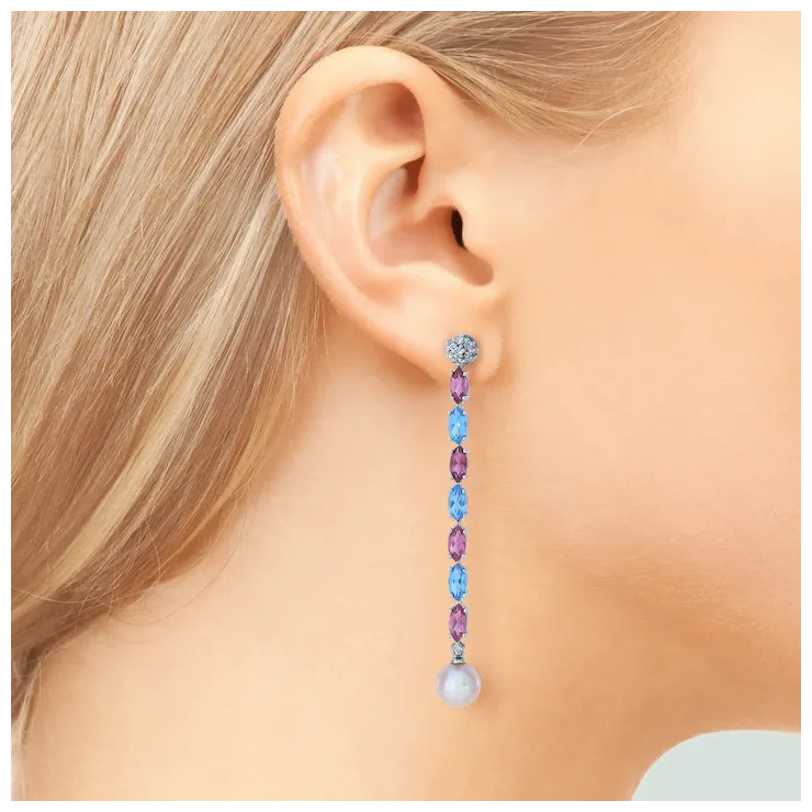 Multicolored beaded earring worn on a model's ear