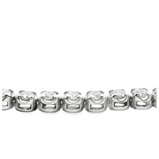 Silver bracelet with rose-shaped charms on a white background