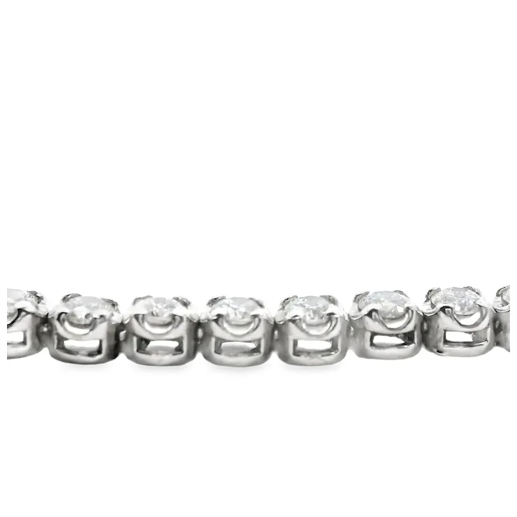 Silver bracelet with rose-shaped charms on a white background