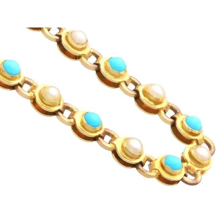 Gold bracelet with turquoise and pearl stones on a white background