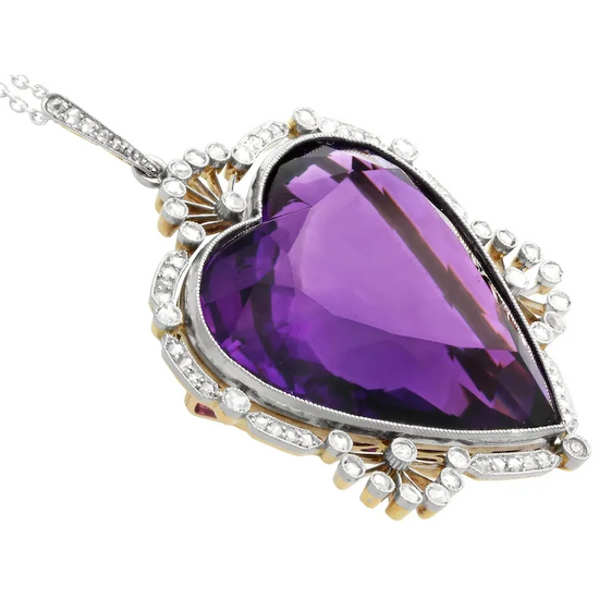 Purple heart-shaped gemstone necklace with silver and gold accents on a white background