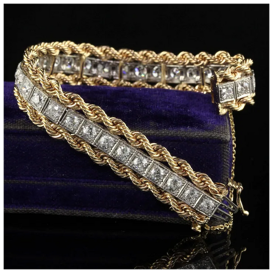 Gold bracelet with diamond accents on a dark background