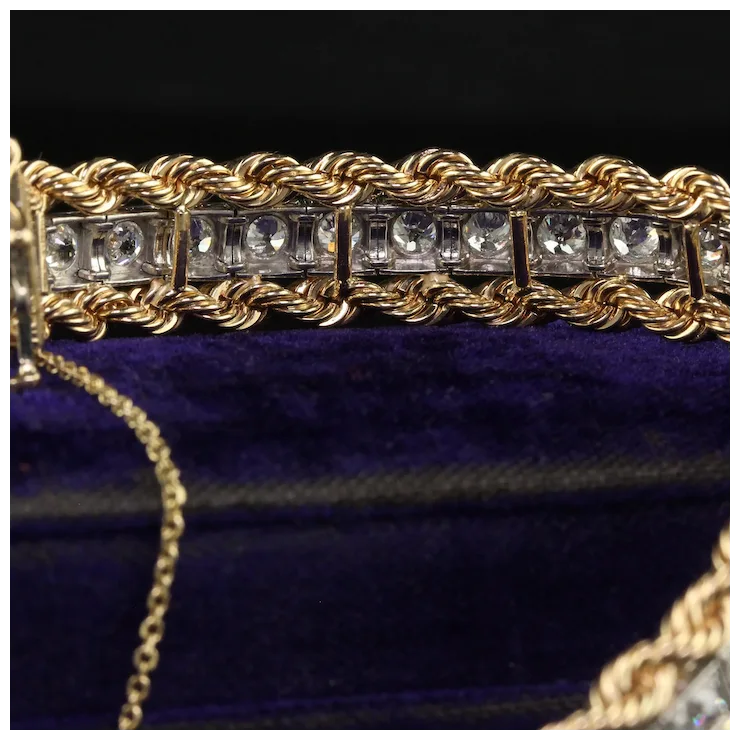 Gold chain with diamond-like stones on a dark background