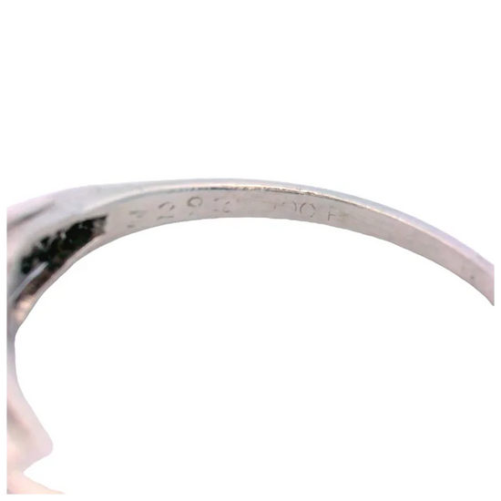 Close-up of a silver ring on a white background