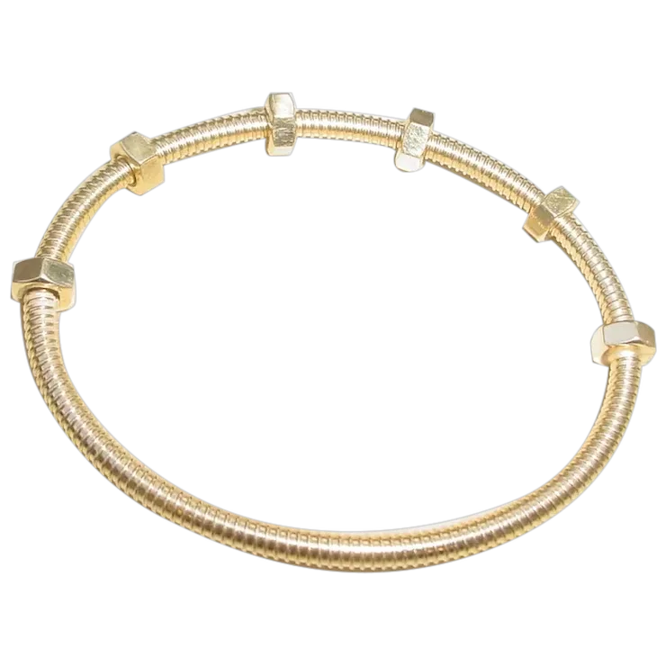 Gold bracelet with interlocking design on a white background