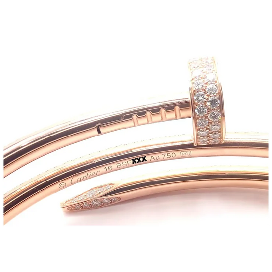 Rose gold bracelet with diamond accents on a white background