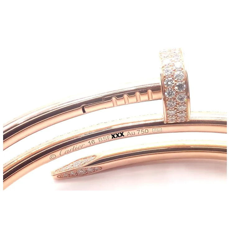 Rose gold bracelet with diamond accents on a white background