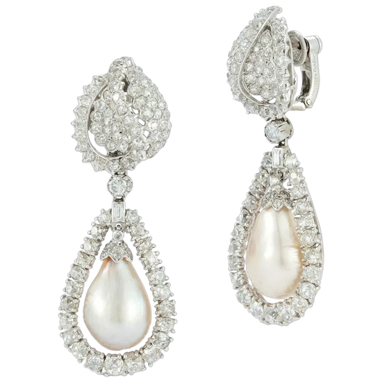 Teardrop-shaped earrings with pearls and diamonds on a white background