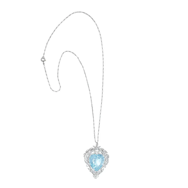 Necklace with a heart-shaped blue pendant on a white background