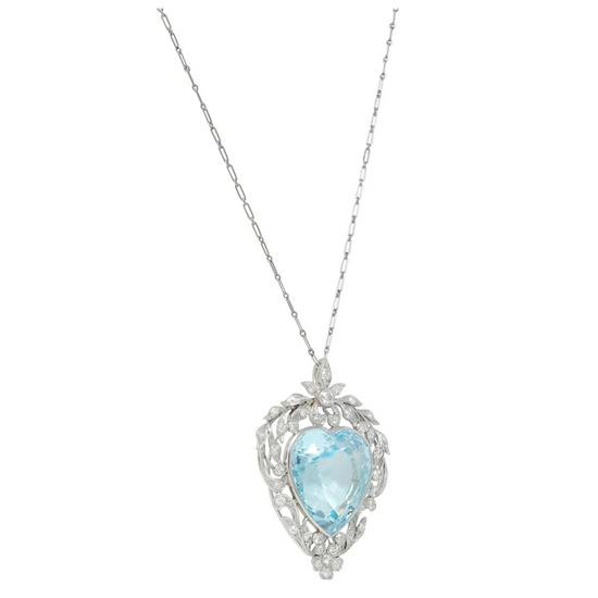 Necklace with a heart-shaped blue gemstone pendant on a white background