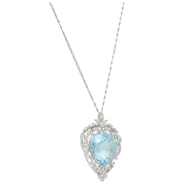 Necklace with a heart-shaped blue gemstone pendant on a white background