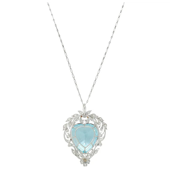 Necklace with a heart-shaped light blue pendant on a white background