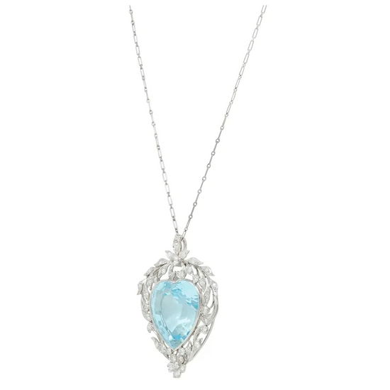 Necklace with a heart-shaped blue gemstone pendant on a white background