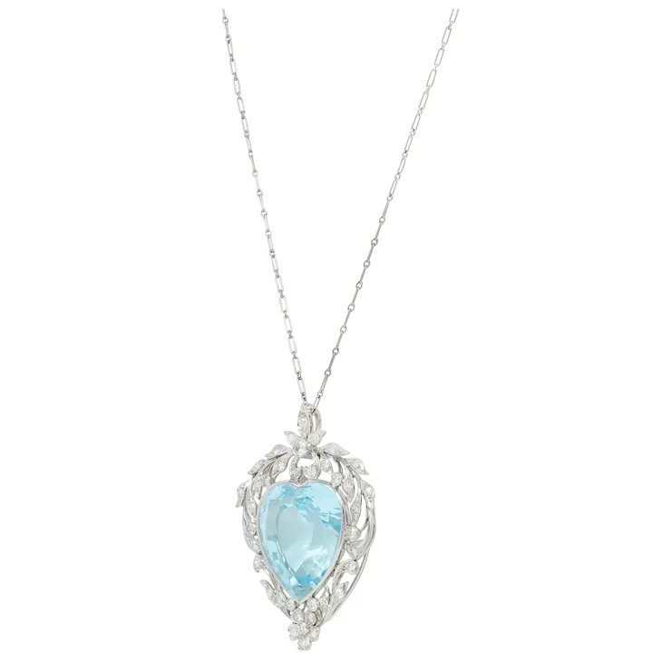 Necklace with a heart-shaped blue gemstone pendant on a white background