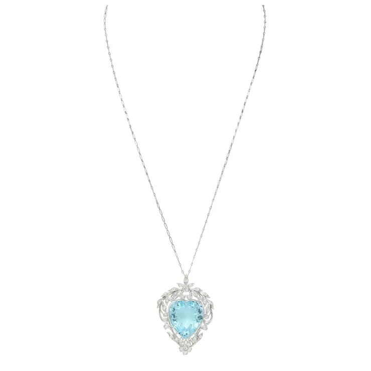 Necklace with a heart-shaped blue gemstone pendant on a white background