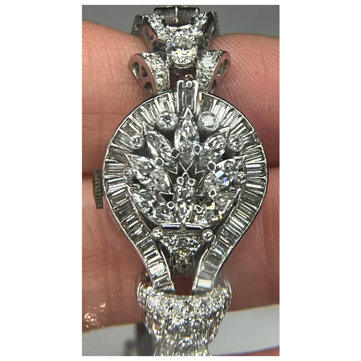 Silver bracelet with diamond accents on a hand