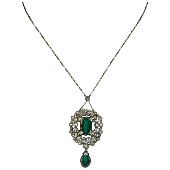 Elegant necklace with a green gemstone pendant on a white background