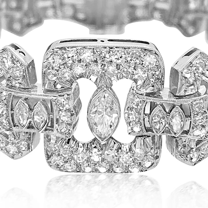 Close-up of a diamond-encrusted bracelet with a blurred background