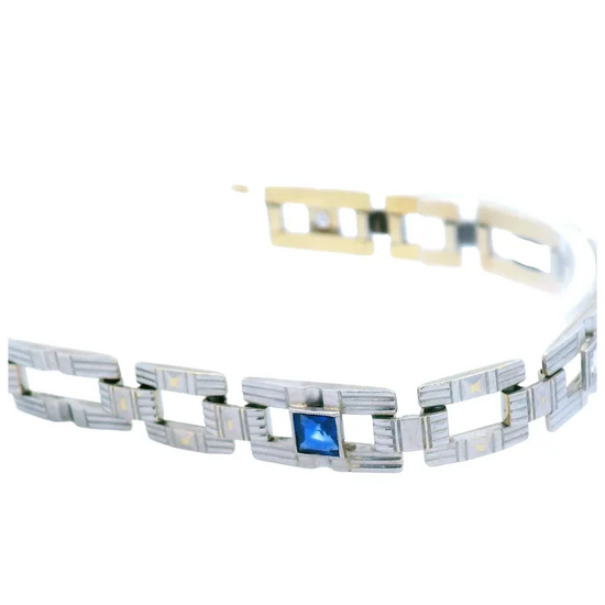 Bracelet with blue gemstone on a white background