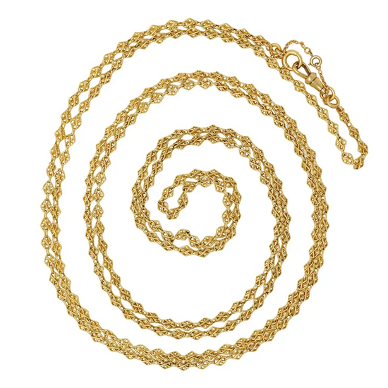 Gold chain necklace on a white background