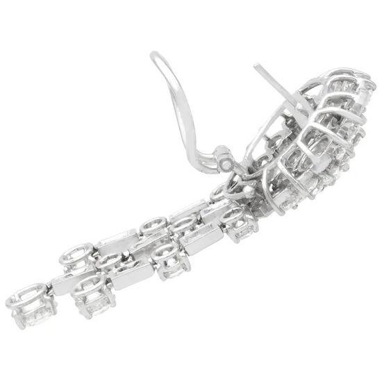 Silver bracelet with chain design on a white background