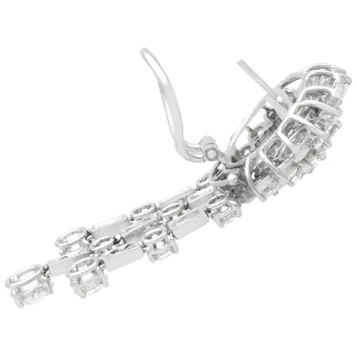Silver bracelet with chain design on a white background