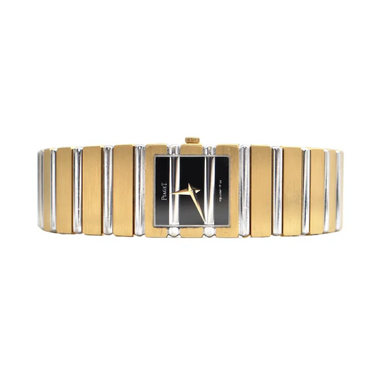 Two-tone watch with gold and silver band on a white background