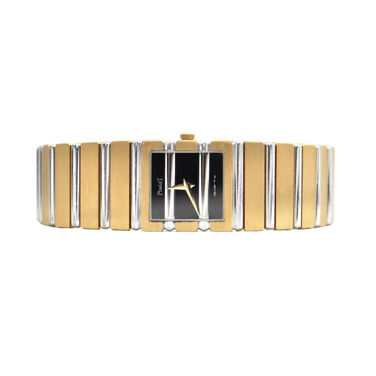 Two-tone watch with gold and silver band on a white background