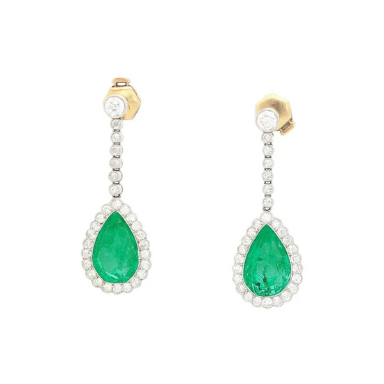 Pair of emerald and diamond earrings on a white background