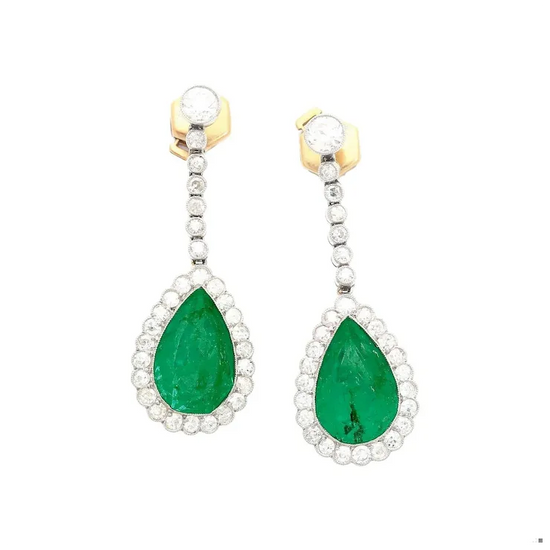 Pair of earrings with green gemstones and gold accents on a white background