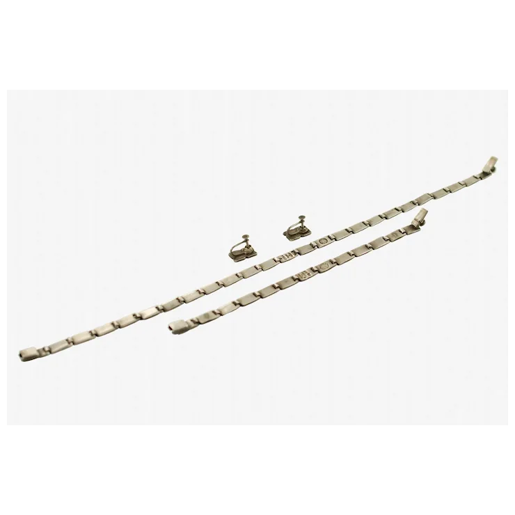 Set of metal chains and links on a white background